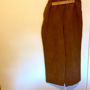Brown feels like suede pants. Size 10 petite- good condition.